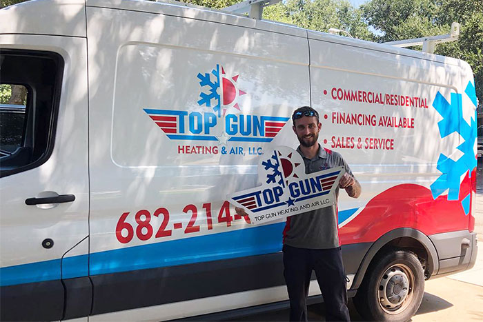 Man with Top Gun service van.