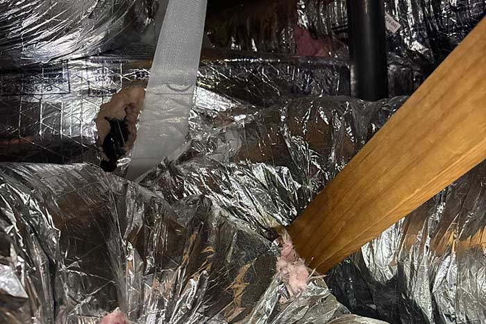 Damaged duct needing HVAC repair