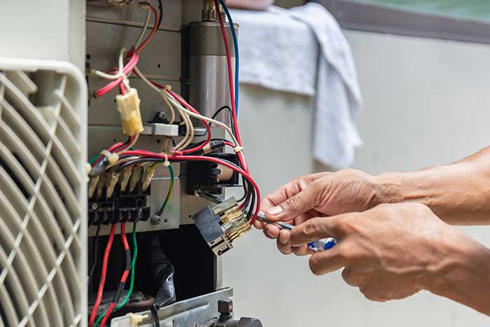 Home furnace being serviced