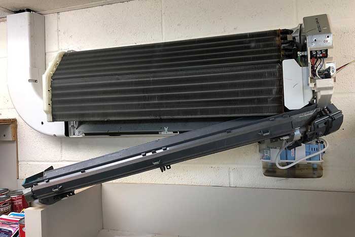Ductless Mini-split system under repair.