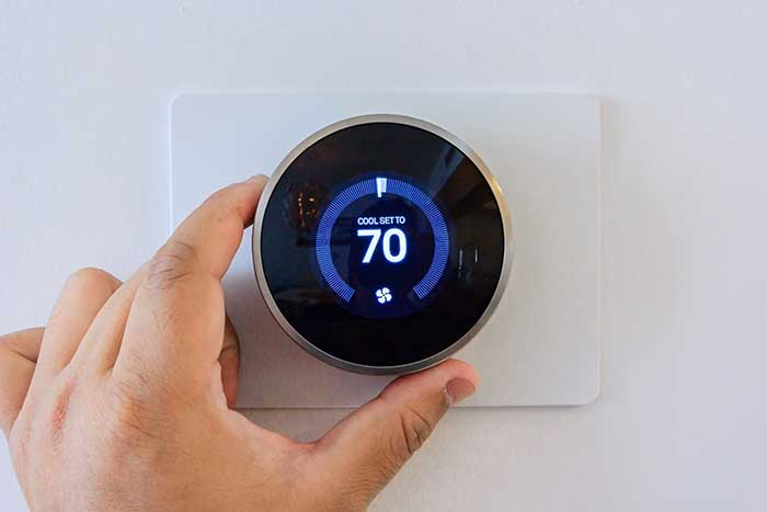Thermostat being serviced
