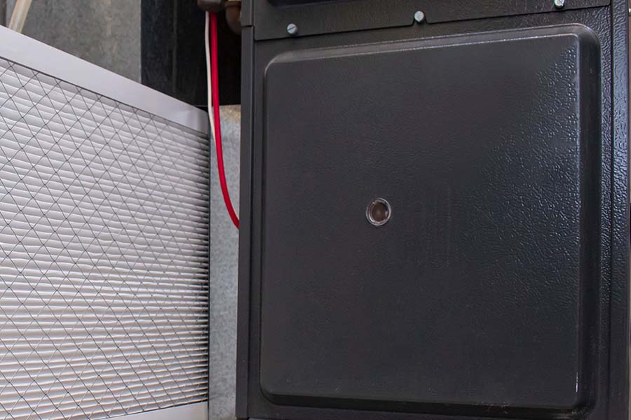 Closeup of furnace and air filter.