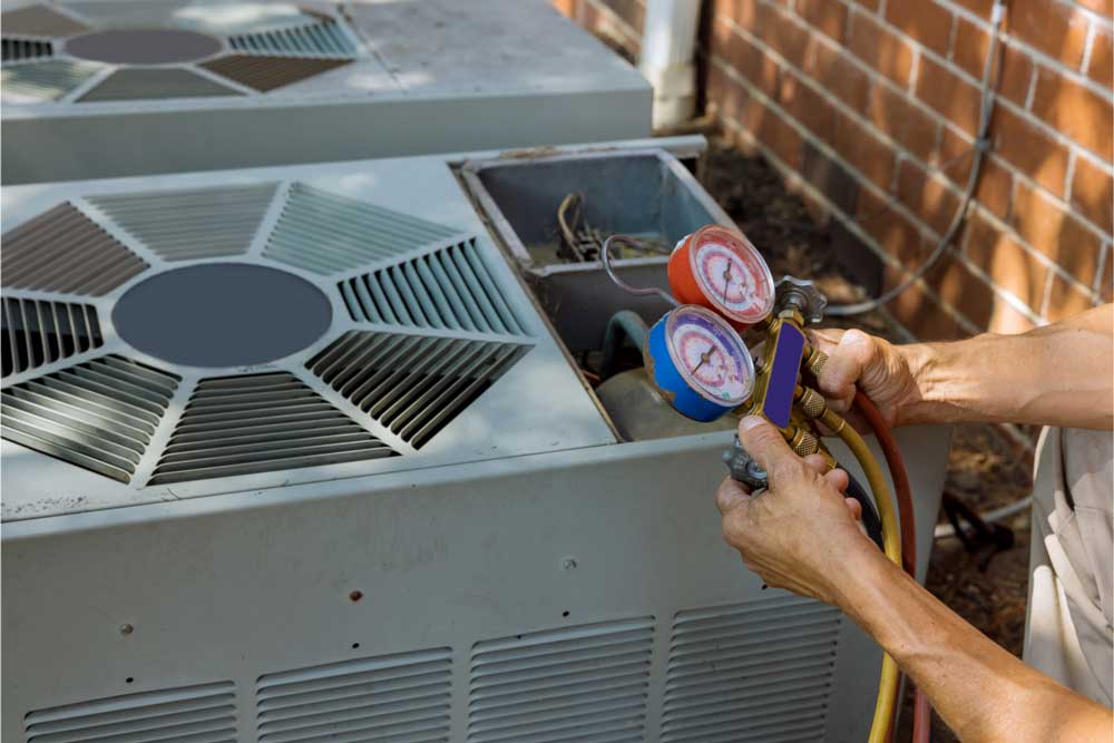 Technician performing AC maintenance